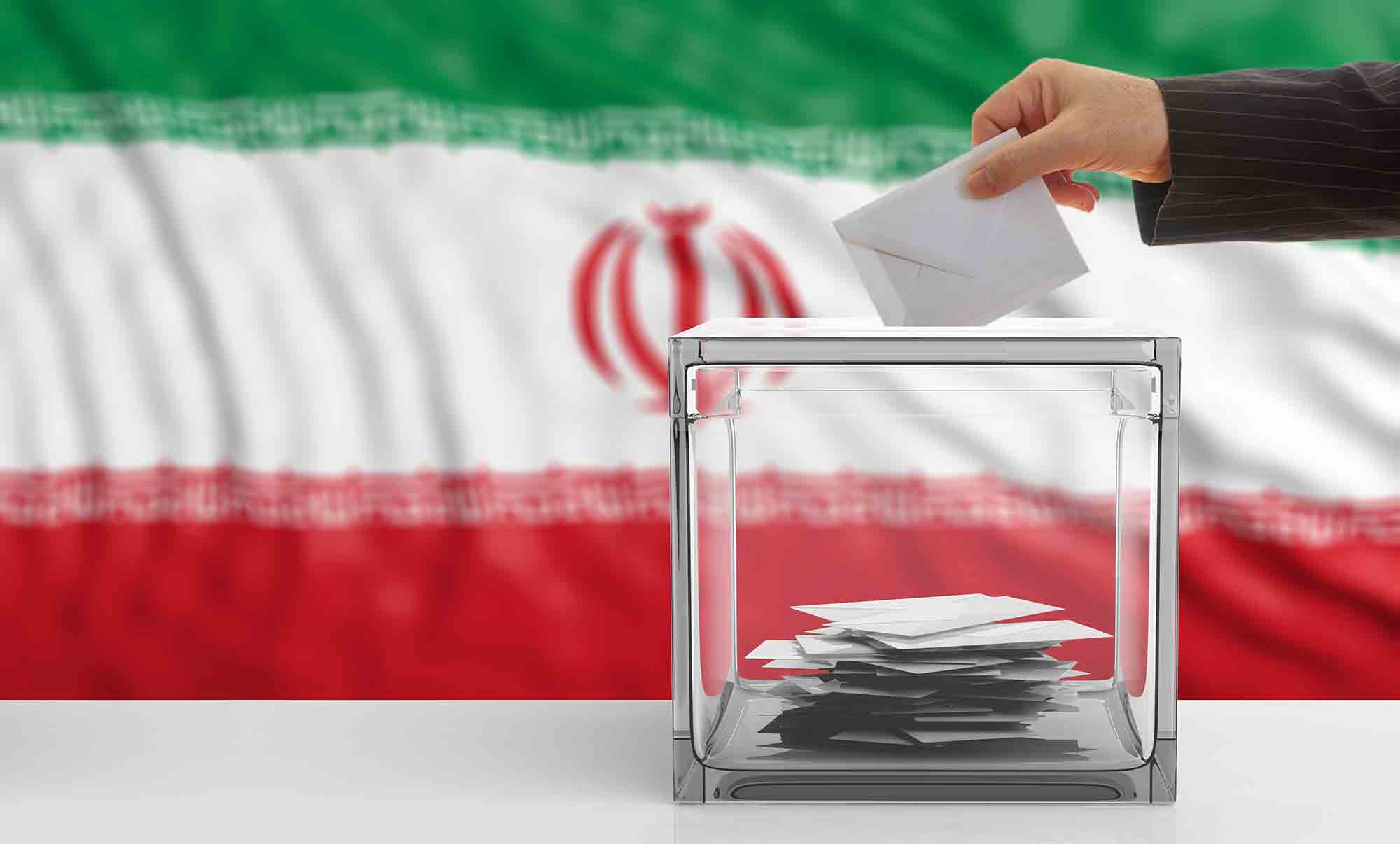 پرچم جمهوری اسلامی ایران و صندوق رای